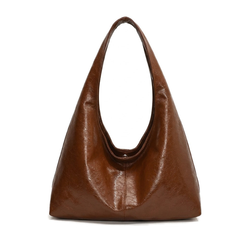 Sac hobo souple en cuir cognac Jeanne, vue de face sur fond blanc