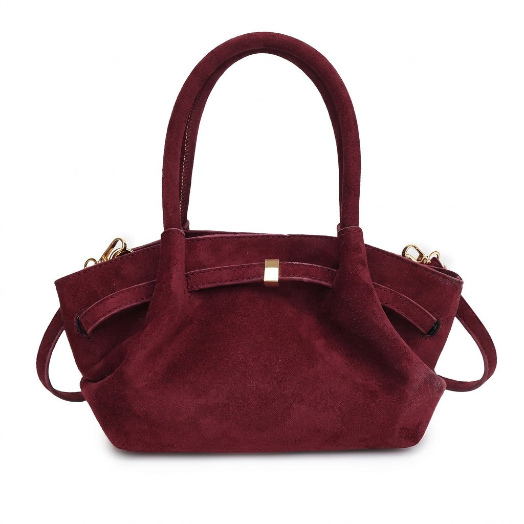 Sac trapèze en cuir bordeaux Flore avec ceinture à fermoir doré, vue de face sur fond blanc