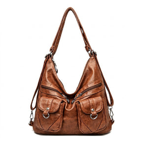 Sac à dos transformable en cuir cognac Nine, vue de face sur fond blanc