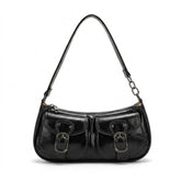 Sac porté épaule en cuir noir Garance à deux poches et boucles argentées, vue de face sur fond blanc