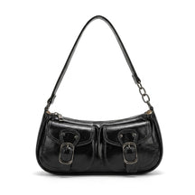 Sac porté épaule en cuir noir Garance à deux poches et boucles argentées, vue de face sur fond blanc