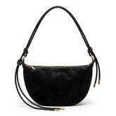 Sac croissant en cuir noir Héloïse avec anse nouée et anneaux dorés, vue de face sur fond blanc