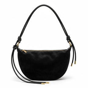 Sac croissant en cuir noir Héloïse avec anse nouée et anneaux dorés, vue de face sur fond blanc