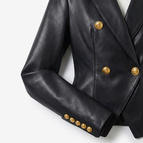 Détail des boutons dorés du revers et du poignet de la veste Bertille noire