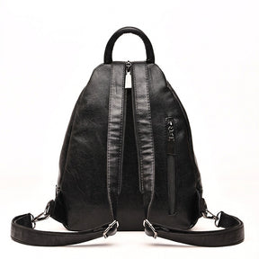 Dos du sac à dos Ninon noir avec poche verticale zippée et bretelles à mousquetons