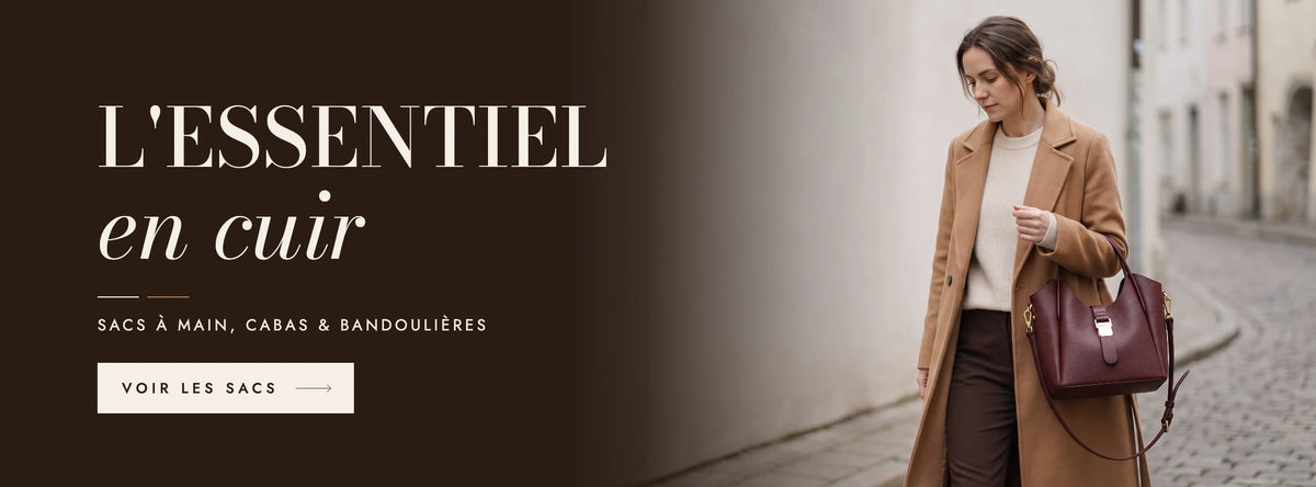 L'essentiel en cuir : femme en manteau camel portant le sac seau en cuir bordeaux Ondine